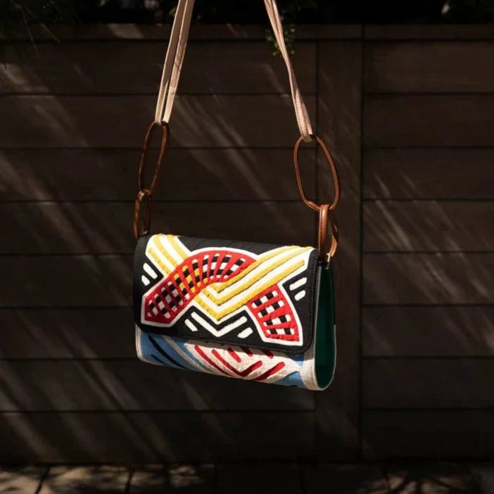 Contrasts in Red Small Kuna Clutch by Mola Sasa at White Label Project