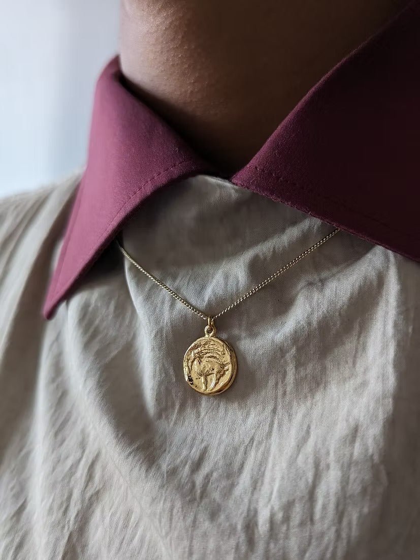 Capricorn Necklace - Gold by Kiala Kanzi at White Label Project