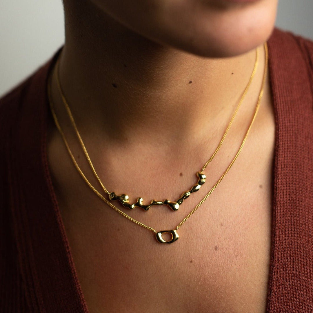 Cx Necklace — Gold by Curadox at White Label Project