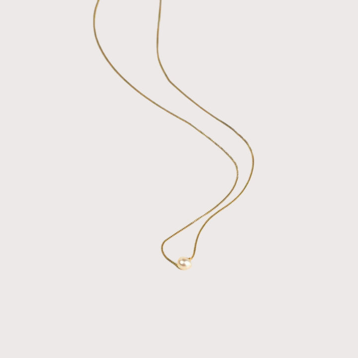 Dainty Peach Pearl Necklace by Lorne at White Label Project